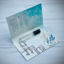 Load image into Gallery viewer, Sample bottle of Ever Present. Bottle in a booklet style sample offering.
Reads "where nature meets luxury"